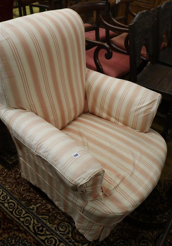A late Victorian Howard style chair with loose cover